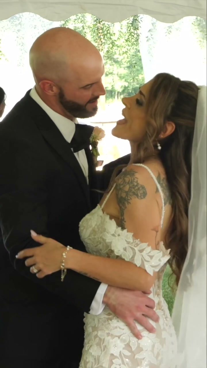Tented reception dance and loving embrace
